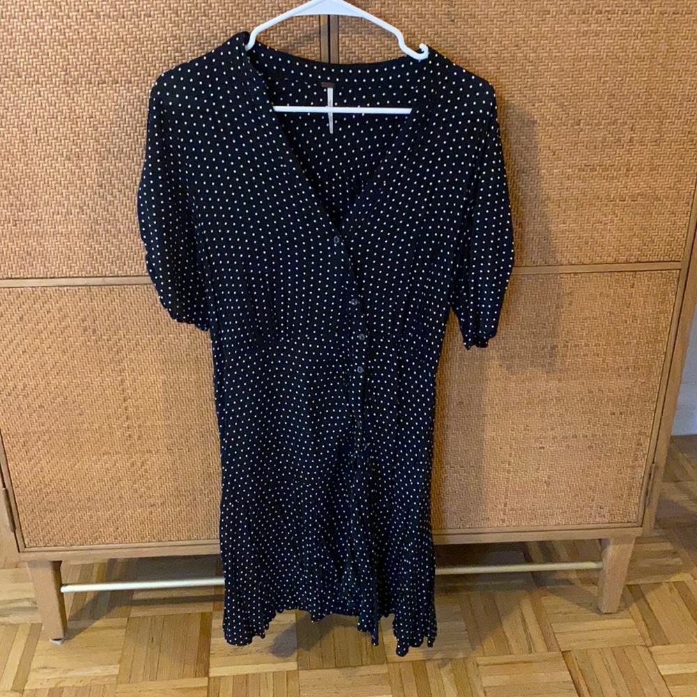 Black and white polka dot asymmetrical button up dress